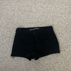 Women’s size 4 black jean shorts.